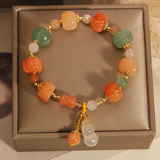 Pumpkin Bead Bracelet | Støtt brystkreft
